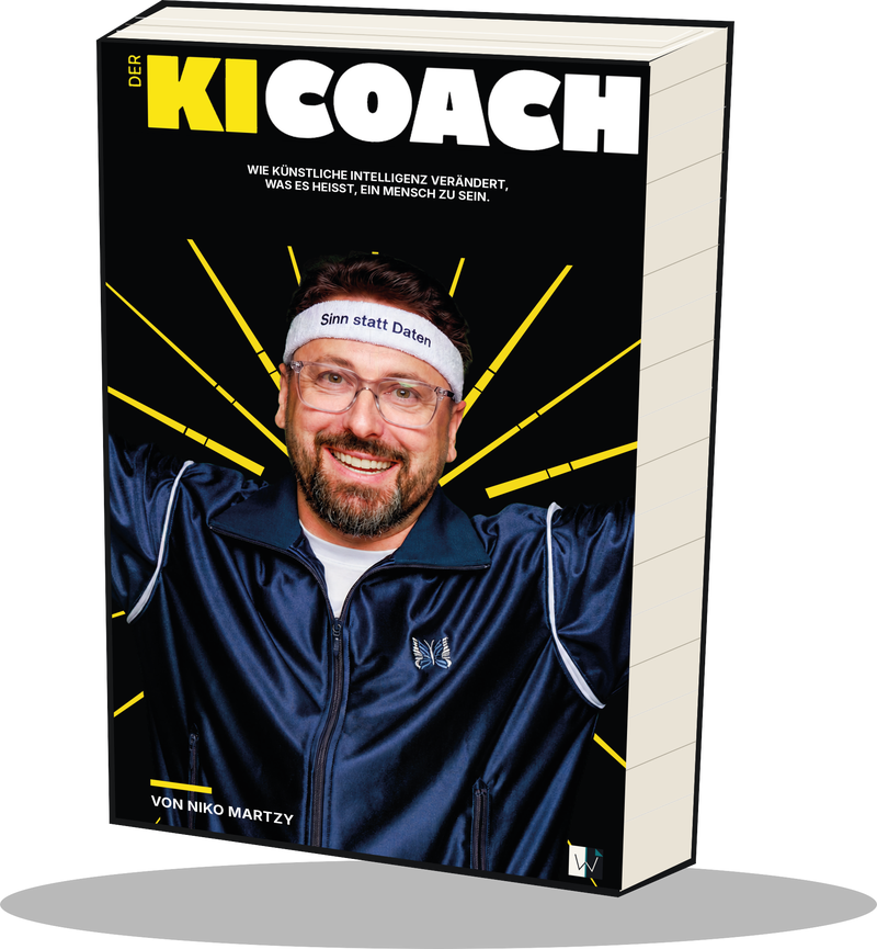 3D-Ansicht des Buchs Der KI-Coach: schwarzes Cover mit gelber Wortmarke, Niko Martzy mit Stirnband „Sinn statt Daten“